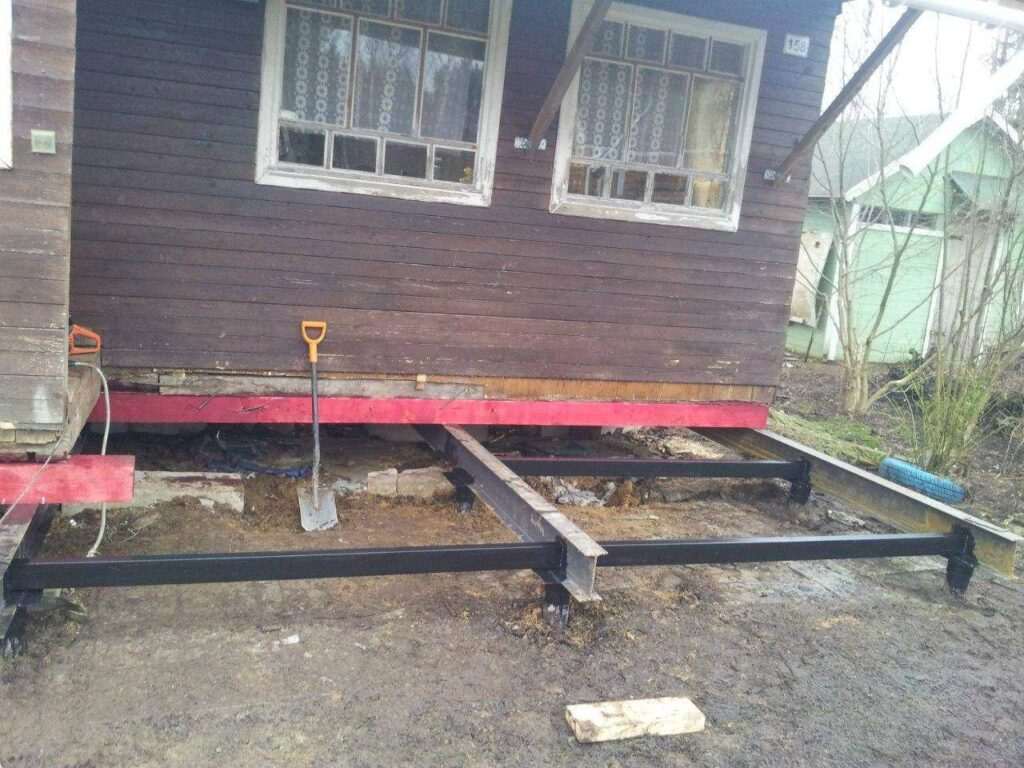 Дом на новом свайном фундаменте после переноса